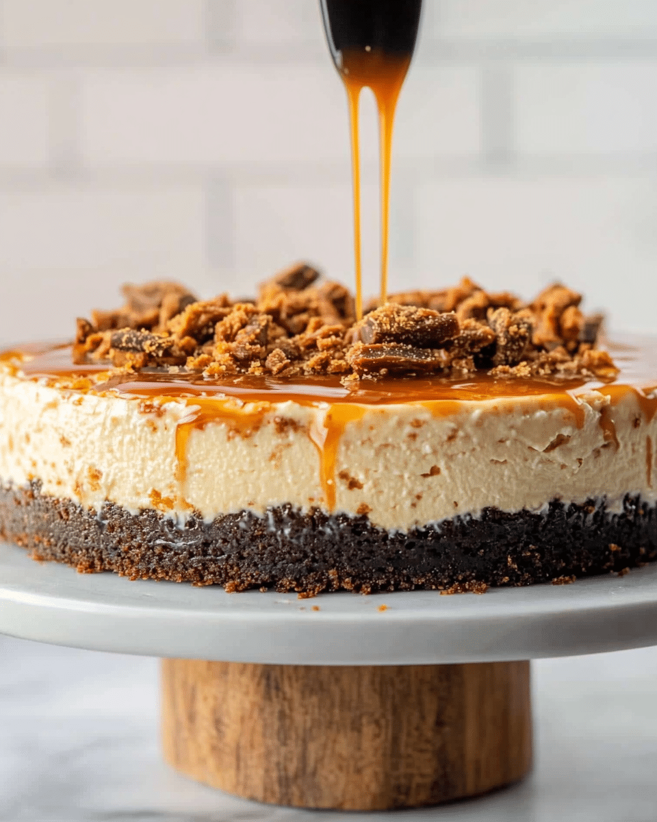 Butterfinger Cheesecake with Caramel Drizzle