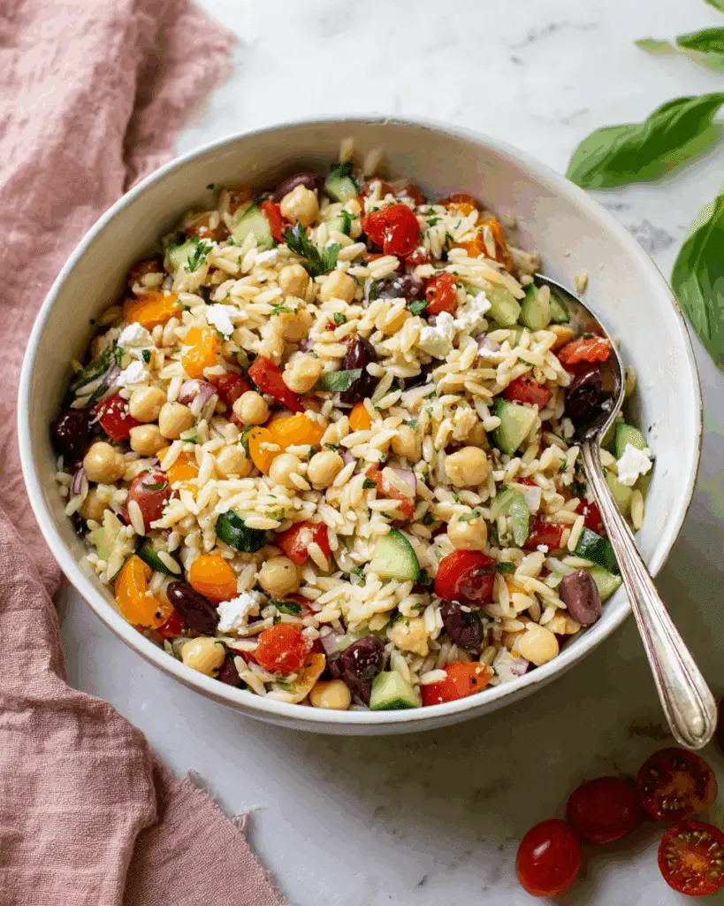Greek-Inspired Orzo Pasta Salad with Feta, Olives, and Cherry Tomatoes Recipe