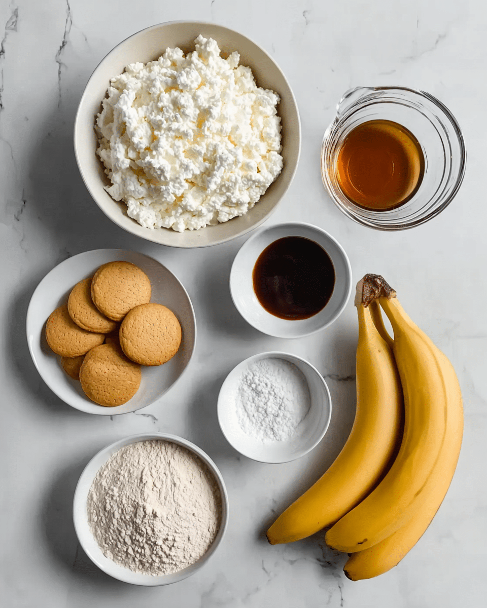 The image shows several ingredients laid out on a white marbled surface. There is a large white bowl filled with cottage cheese placed at the top left. To its right, there is a clear glass measuring cup filled with melted chocolate. Below the chocolate, there is a small white bowl containing a dark liquid, likely vanilla extract. To the left of that, a small white bowl holds round golden brown cookies. Below the cookies, a small white bowl filled with flour is positioned, and next to it on the right, there is another small white bowl filled with white sugar. On the right side of the image, three yellow bananas rest side by side. The overall arrangement is neat and well spaced. Photo taken with an iphone --ar 4:5 --v 7