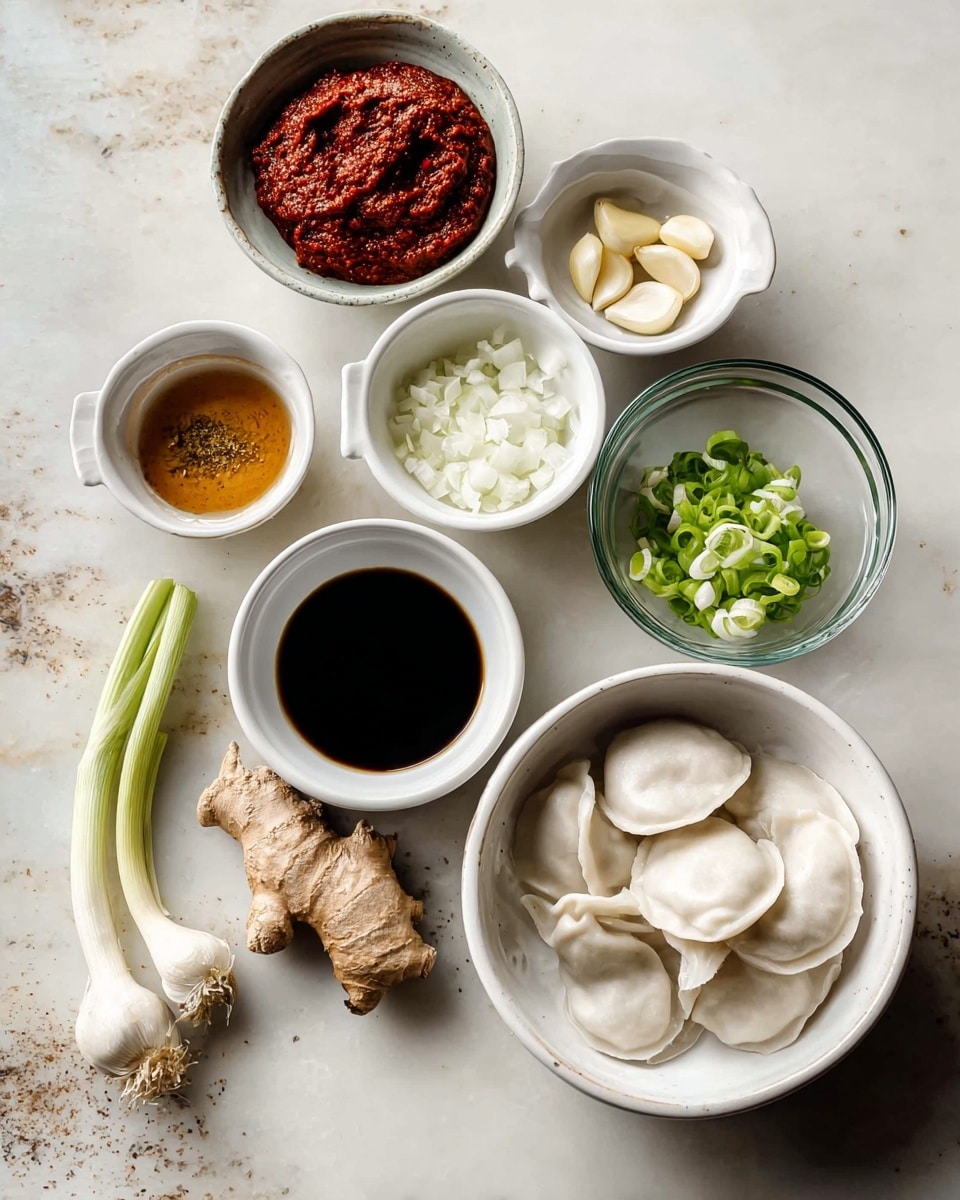 The image shows a collection of ingredients arranged neatly on a white marbled surface. There are seven small white bowls and one glass bowl, each holding different ingredients: one bowl has a thick red paste, another contains chopped white onions, a third holds sliced green onions, one has three peeled garlic cloves, and another contains a dark soy-like liquid. The glass bowl has a light brown sauce or oil. There is a piece of ginger root and a stalk of lemongrass placed directly on the surface. Additionally, a white bowl holds several uncooked white dumplings with a smooth texture. All items are spread out in a flat lay style. Photo taken with an iphone --ar 4:5 --v 7