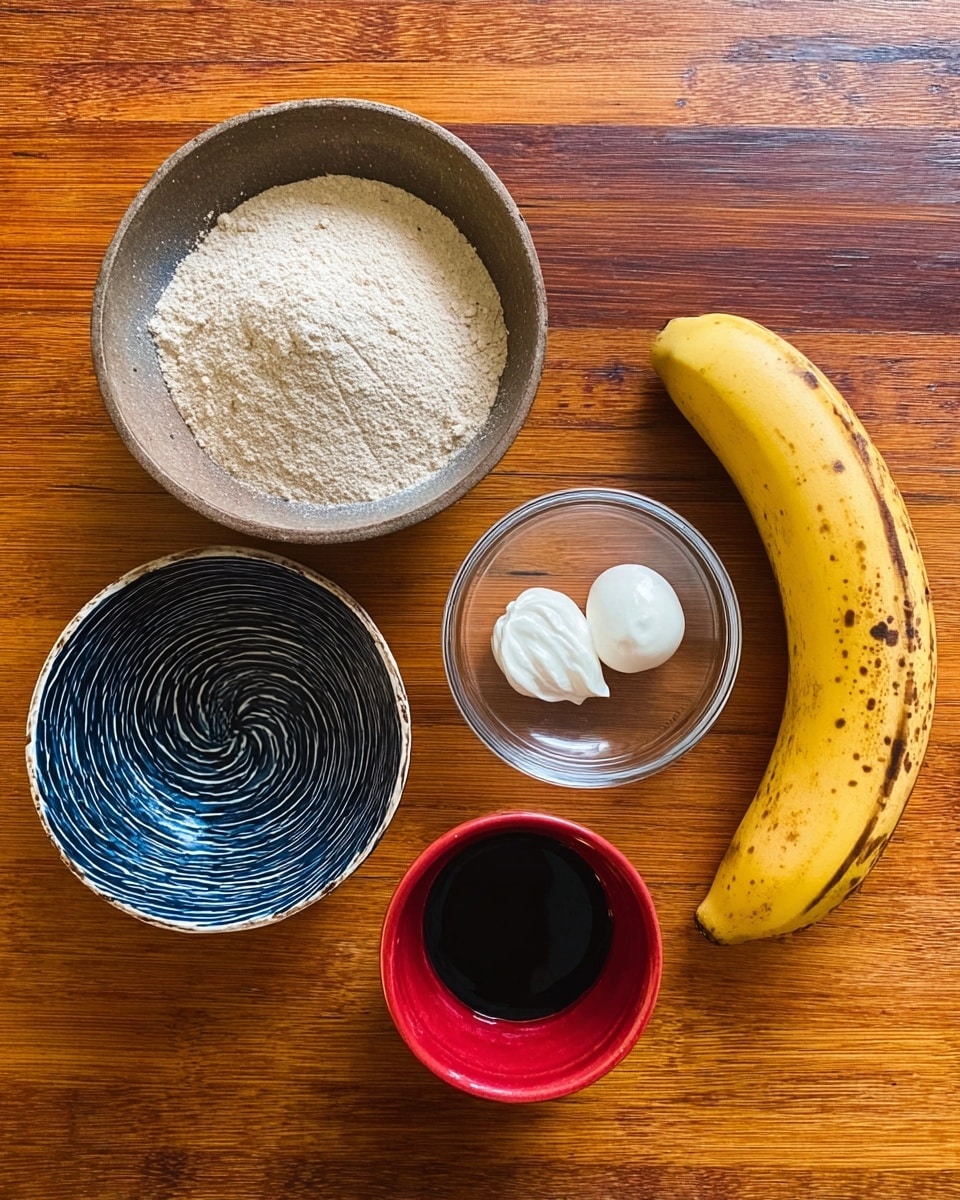 The image shows five ingredients placed on a wooden surface. At the top center, there is a round bowl filled with a beige powdery substance. Below it and to the left, there is an empty small bowl with a dark blue swirl pattern. To the right of the blue bowl, there is a small clear glass bowl containing two white dollops of a creamy substance. Below the clear bowl, there is a small red cup filled with a dark liquid. To the right of the red cup, a whole yellow banana with brown spots lies horizontally. photo taken with an iphone --ar 4:5 --v 7
