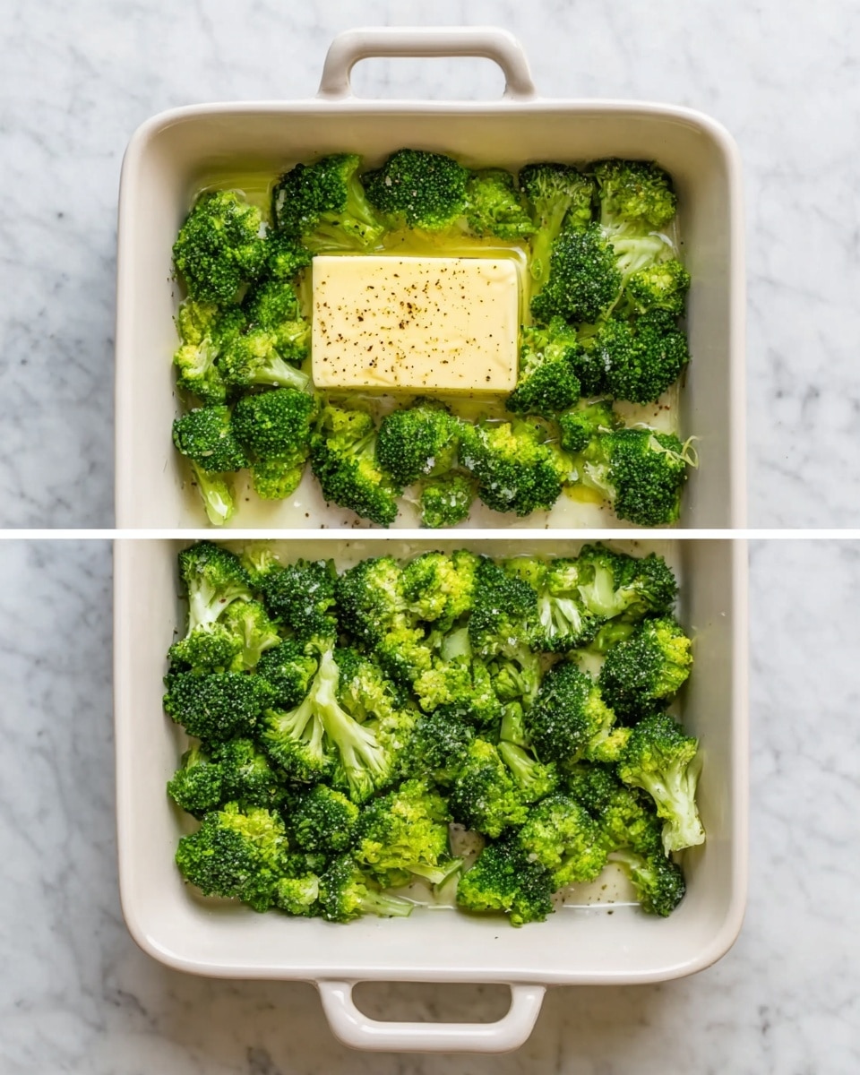 The image shows a white rectangular baking dish on a white marbled surface. Inside, there are two layers: the bottom layer is a bed of vibrant green broccoli florets spread evenly across the dish, with a texture that looks fresh and slightly moist. In the second stage, a single square block of pale yellow cheese sits in the middle of the broccoli, topped with a sprinkling of black pepper. The broccoli surrounds the cheese on all sides, filling the dish but leaving a clear space for the cheese in the center. The dish handles frame the food on both sides. photo taken with an iphone --ar 4:5 --v 7