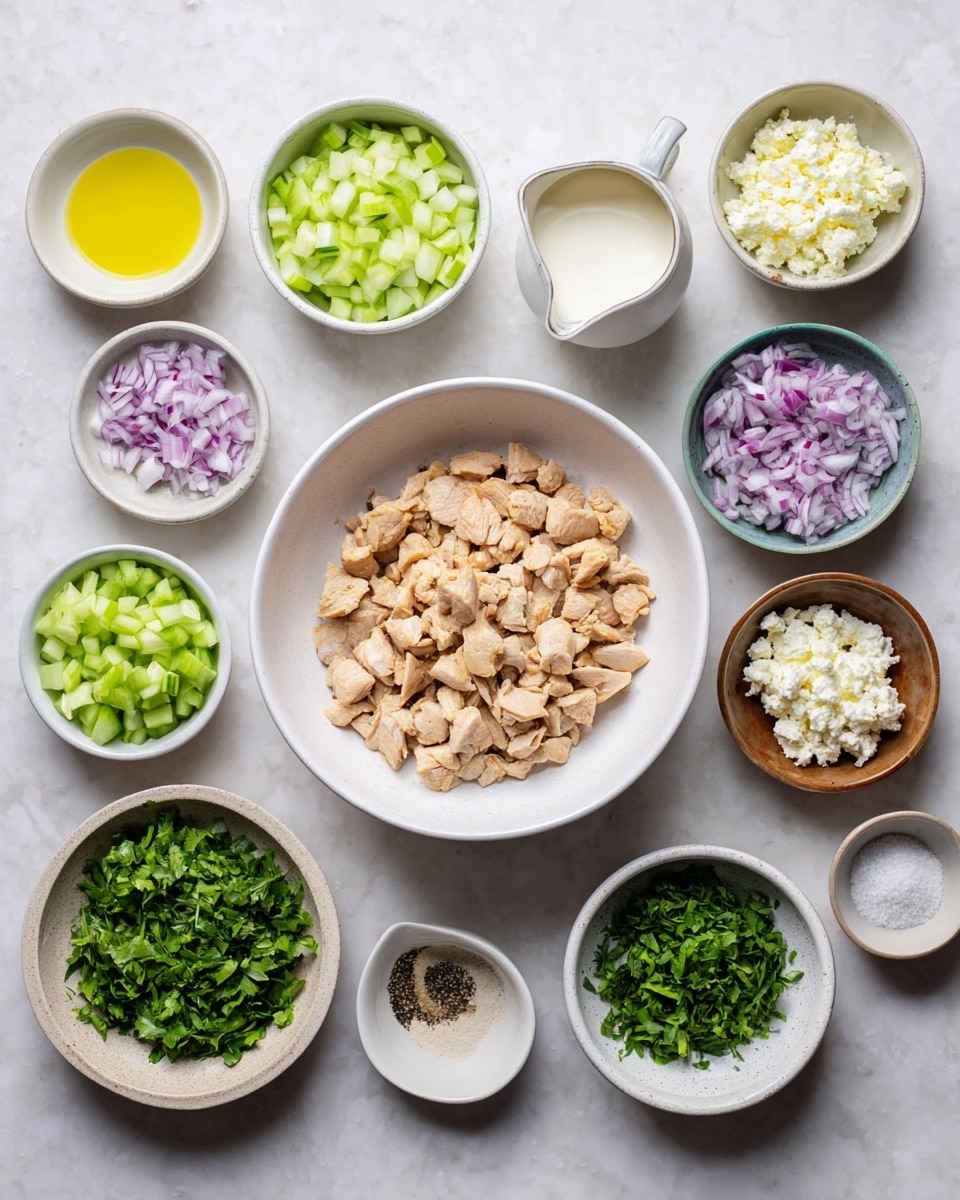 A flat lay image showing various ingredients in white bowls arranged neatly on a white marbled surface. At the center is a white bowl filled with small, light brown chopped cooked chicken pieces. Surrounding it are bowls with finely chopped celery in light green, diced cucumber in darker green, finely grated pale green cucumber mixed with chopped herbs, finely chopped purple onion, chopped dark green cilantro, chopped bright green parsley, and creamy white yogurt in a small cup with a handle. There is also a small bowl of oil that is light yellow, a white saucer with salt, a small brown bowl with crushed garlic, a tiny dish of black pepper, and a half-cup measurement cup containing crumbled white cheese. photo taken with an iphone --ar 4:5 --v 7