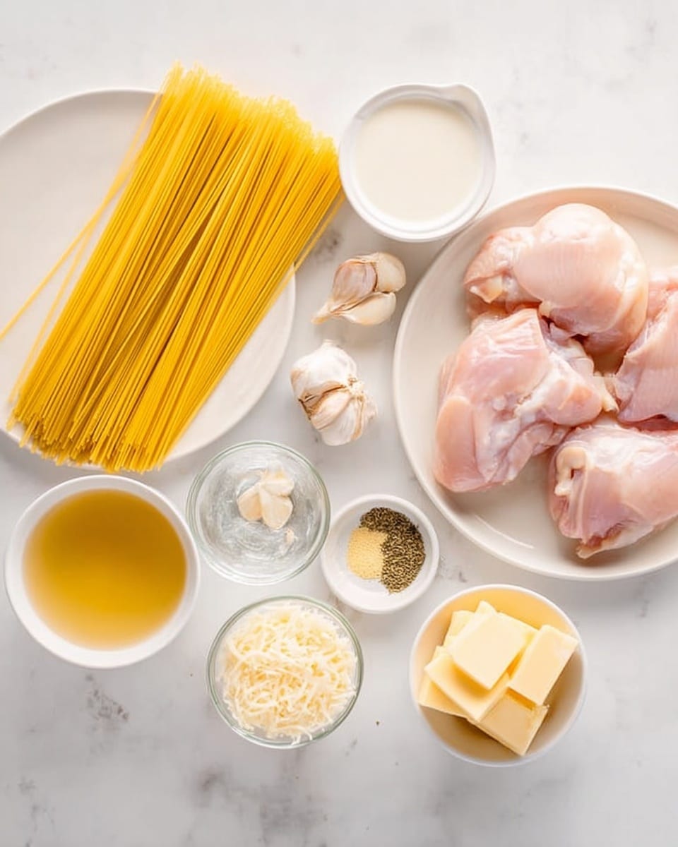 The image shows a white plate with uncooked yellow spaghetti arranged neatly in the left center. To the right, there is a white plate with three raw pink chicken pieces. Surrounding these are small white bowls and glass containers arranged on a white marbled surface, holding white cream, light brown broth, chunks of yellow butter, grated cheese, three garlic cloves, black pepper, salt, and dried herbs. The scene has a clean and bright look with natural light. photo taken with an iphone --ar 4:5 --v 7