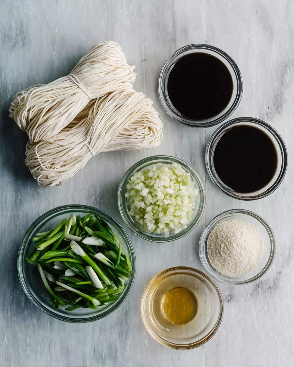 The image shows six small glass bowls arranged on a white marbled surface. At the top left, there is a bundle of uncooked white noodles with a smooth texture, loosely folded with long strands visible. Below the noodles, a bowl contains fresh green vegetable strips with white ends, giving a mix of green and white colors. To the right of the noodles and vegetables, there are two bowls filled with dark brown liquid sauces, smooth and glossy, placed one above the other. Between these two bowls, a smaller bowl holds finely chopped white garlic, with a grainy texture. At the bottom right, two other bowls contain a light golden liquid with a shiny look and a grainy white powder, respectively. photo taken with an iphone --ar 4:5 --v 7