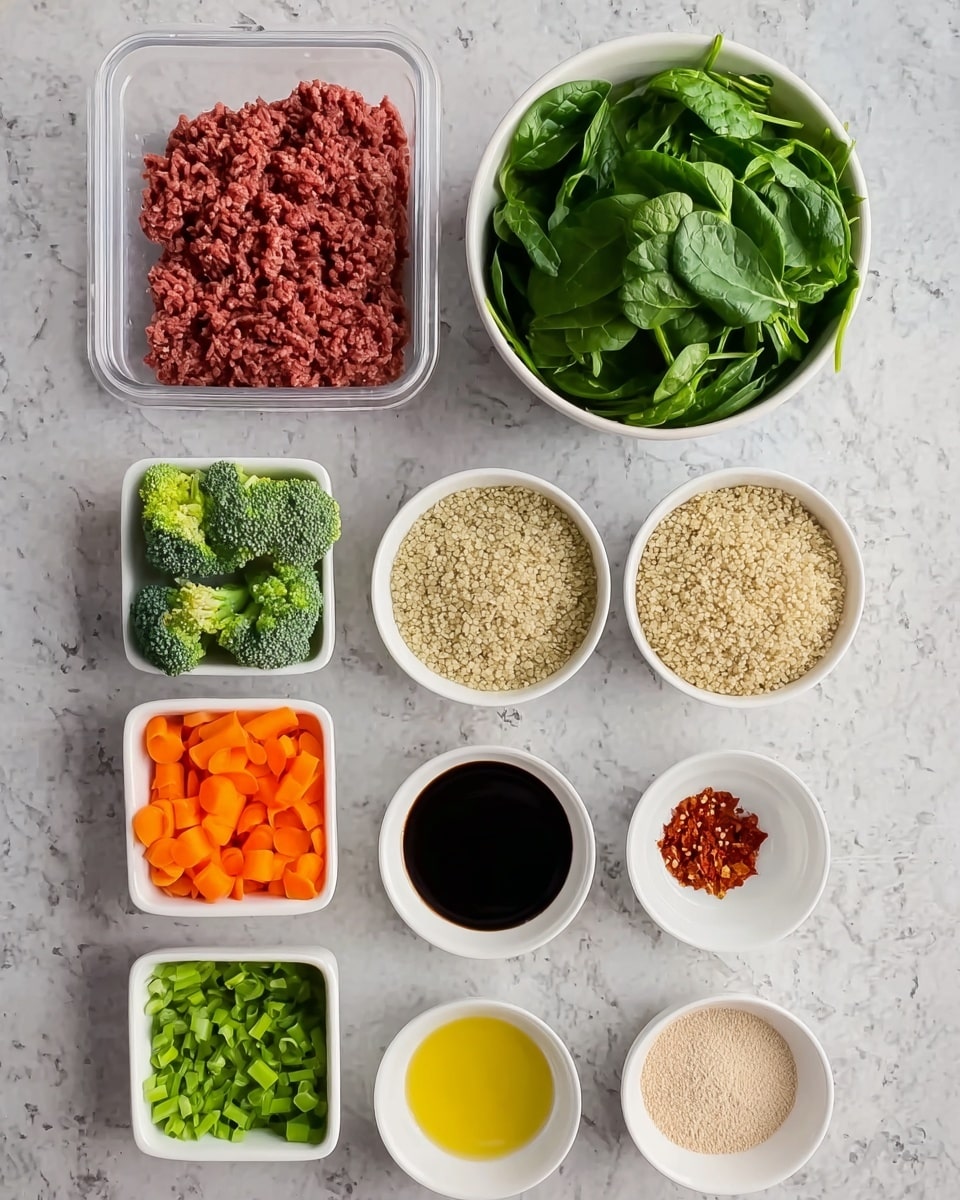 The image shows various separate bowls and a container arranged neatly on a white marbled surface, each holding different fresh ingredients. At the top left, there is a clear plastic container filled with raw ground beef. To the right is a white bowl filled halfway with bright green fresh spinach leaves. Below the spinach are two white bowls the larger one filled with uncooked quinoa, and the smaller one with chopped green onions. On the bottom row from left to right, there are small white bowls containing orange chopped carrots, green broccoli florets, minced garlic, red chili flakes, yellow olive oil, a dark thick sauce (likely soy sauce), and two separate piles of light beige powders or granules, all arranged closely together. The overall look is clean, fresh, and organized, with bright and natural colors highlighting the freshness of the ingredients. Photo taken with an iphone --ar 4:5 --v 7
