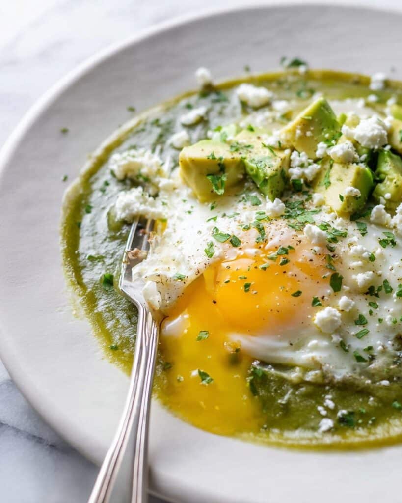 Salsa Verde Eggs with Corn Tortillas, Avocado, and Feta Recipe