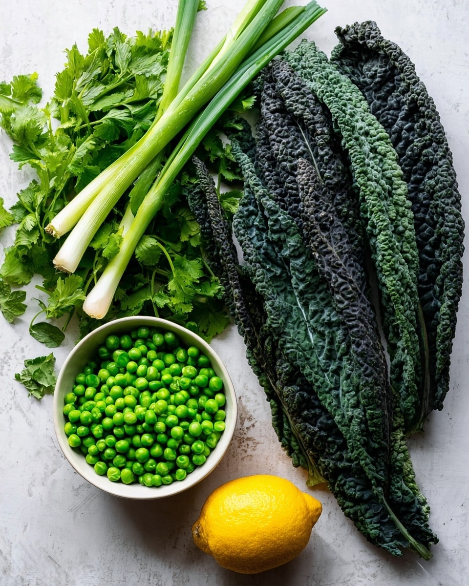 The image shows fresh ingredients laid out on a white marbled surface. On the right side, there are five large dark green kale leaves with a bumpy texture, stacked slightly overlapping. To the left of the kale, there are three green spring onions with white bases and long green tops. Further left, there is a bunch of bright green leafy cilantro with delicate, jagged leaves. On the bottom left, a white bowl is filled with bright green peas, each pea round and shiny, filling the bowl completely. At the bottom center, just below the cilantro, is a whole, round lemon with a bright yellow textured skin. photo taken with an iphone --ar 4:5 --v 7