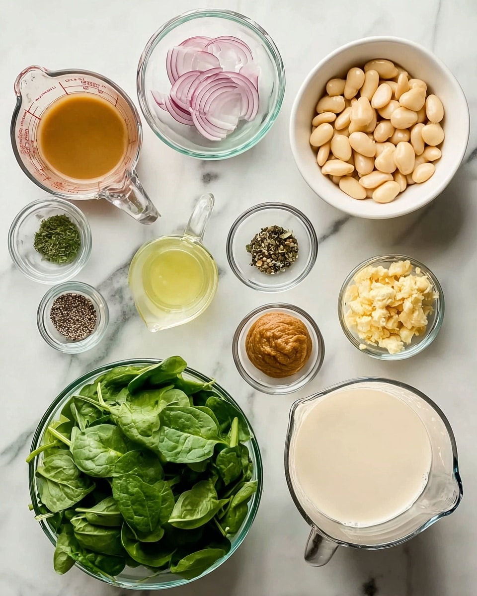 The image shows several clear glass bowls filled with different ingredients arranged neatly on a white marbled surface. Starting from the top left, there is a medium-sized measuring cup with a light brown liquid, followed by a white bowl filled with large, pale yellow beans. Below these, there are smaller clear bowls: one containing thinly sliced light purple shallots, another with black and white speckled pepper, one with a small amount of green herbs, a small glass pitcher holding a pale yellow liquid, a bowl of brown paste, and another small bowl filled with minced light yellow ginger. At the bottom, a large clear glass bowl holds fresh, bright green spinach leaves, and next to it is a clear measuring jug filled with a creamy white liquid. photo taken with an iphone --ar 4:5 --v 7