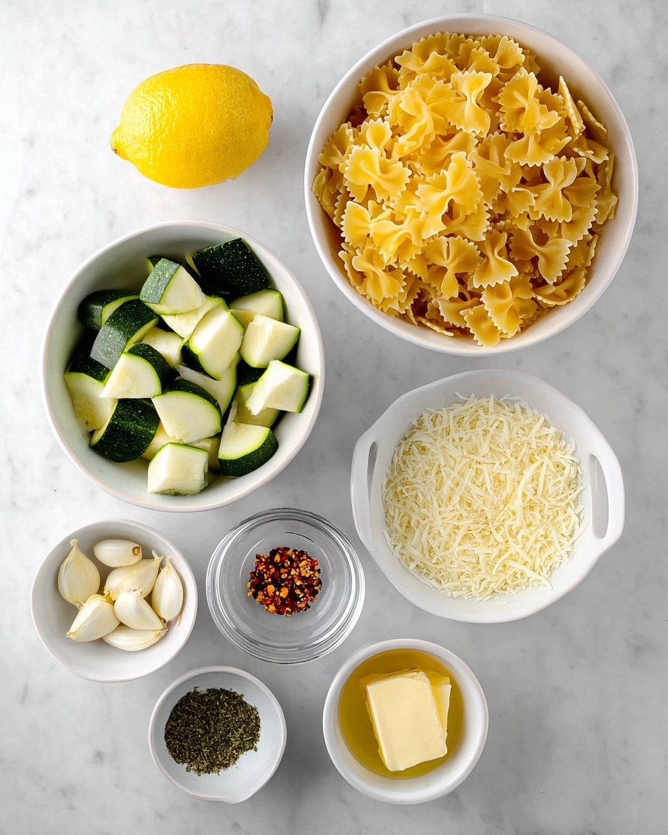 The image shows an overhead view of several bowls on a white marbled surface, each holding different cooking ingredients. In the top right, a white bowl is full of uncooked yellow farfalle pasta. To its left, there is half a bright yellow lemon. Below the lemon, another white bowl contains chopped green zucchini pieces with creamy white centers. To the right of the zucchini, a white cup is filled with finely grated pale yellow parmesan cheese. Below these bowls, a clear small bowl holds chopped garlic. On the bottom left, a white bowl has three small piles of dried herbs and red pepper flakes in green, black, and red shades. Next to it, on the right side, a white bowl has two pale yellow butter pieces. Finally, in the bottom right corner, another white cup contains golden olive oil. photo taken with an iphone --ar 4:5 --v 7
