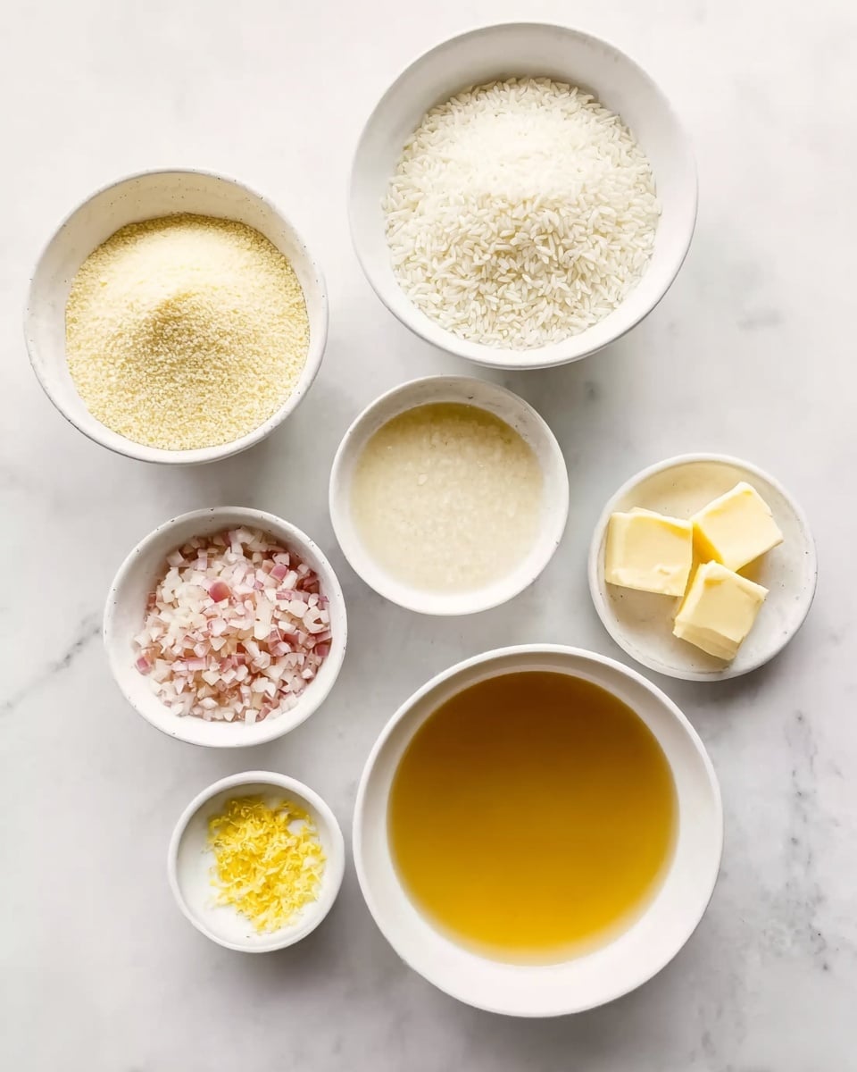Seven white bowls are arranged on a white marbled surface. The largest bowl in the lower right is filled with a golden yellow liquid broth. To the left of that is a slightly smaller bowl filled with a pale yellow powdery ingredient. Above that is a bowl with a grainy white ingredient, possibly rice. On the upper left is a bowl filled with white rice grains. Moving right, there is a bowl of a light creamy liquid, next to it is a smaller bowl containing small chopped pink and white pieces, likely shallots. To the right of that is a small bowl with two pieces of pale yellow solid butter. Below and to the left, a small bowl holds grated yellow zest. The whole arrangement is clean and bright. Photo taken with an iphone --ar 4:5 --v 7