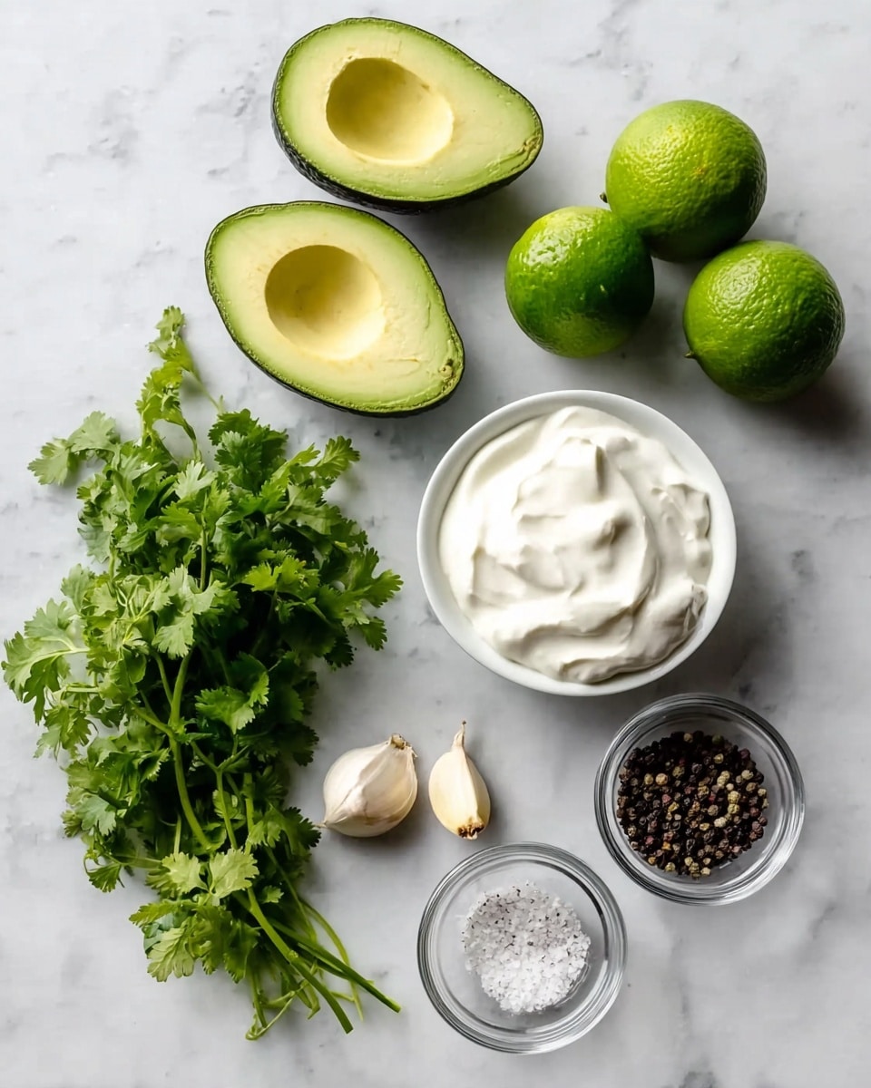 The image shows several fresh ingredients on a white marbled surface. There are two halves of a ripe avocado with smooth, pale green flesh and darker green skin placed top left. To the right of the avocado, two bright green limes sit close together. Below the limes is a small white bowl full of thick, creamy white yogurt. To the left of the yogurt is a bunch of fresh cilantro with vibrant green leaves and stems. Below the cilantro, two garlic cloves with light beige skin are placed side by side. To the right of the garlic cloves are two small clear glass bowls; one filled with black peppercorns and the other with coarse white salt. The layout is neat and all ingredients are spaced evenly. Photo taken with an iphone --ar 4:5 --v 7