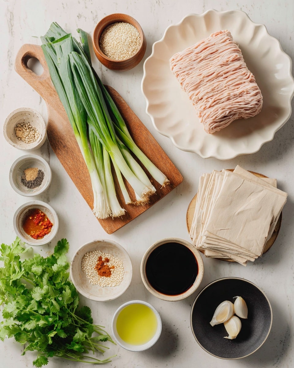 The image shows a flat lay of fresh ingredients on a white marbled surface. In the top right, there is a white scalloped plate with a large block of light pink ground meat, arranged in parallel strands. To the left on a light wooden cutting board, there are several long green onions with dark green and white parts. Below the green onions, a wooden bowl holds small white sesame seeds. Nearby, a stack of pale thin square wrappers rests on the cutting board. On the bottom left corner, fresh bright green cilantro leaves sit loosely. Around the center and right side are small white and beige bowls holding various seasonings and sauces: dark soy sauce, black pepper, light beige minced garlic, shiny chili oil with red flakes, light green oil, and two peeled garlic cloves in a small black bowl. The arrangement is neat and well-lit. Photo taken with an iphone --ar 4:5 --v 7